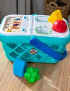 Baby Einstein Hape Magic Touch Shopping Basket aktivity hračka 9 m+ 1 ks