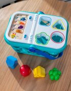 Baby Einstein Hape Magic Touch Shopping Basket aktivity hračka 9 m+ 1 ks