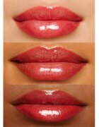 Clarins Lip Perfector Glow třpytivý lesk na rty a tváře odstín 23 pomegranate glow 12 ml