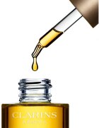 Clarins Lotus Treatment Oil regenerační olej s vyhlazujícím účinkem na den i noc 30 ml