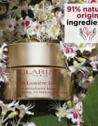 Clarins Nutri-Lumière Day revitalizační denní krém pro zářivý vzhled pleti 50 ml