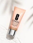 Clinique Moisture Surge™ Sheertint Hydrator SPF 25 tónující hydratační krém SPF 25 odstín Universal Medium 40 ml