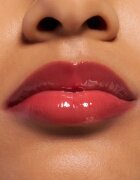 essence Juicy Bomb lesk na rty se zvětšujícím efektem odstín 05 Soft Apricot 2.6 ml