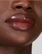 Estée Lauder Pure Color Melt-On Glosstick vysoce pigmentovaný lesk na rty v tyčince odstín Melted Scarlet 1.8 g