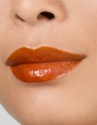 Estée Lauder Pure Color Melt-On Glosstick vysoce pigmentovaný lesk na rty v tyčince odstín Melted Tangerine 1.8 g
