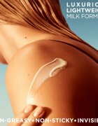 Garnier Ambre Solaire Ideal Bronze opalovací mléko ve spreji na tělo SPF 50 150 ml