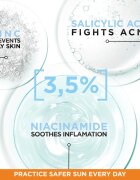 Garnier Ambre Solaire Super UV Niacinamide lehký ochranný fluid proti nedokonalostem pleti SPF 50+ 40 ml