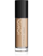 JOKO Luminous Touch lehký make-up pro jednotný tón pleti odstín 104 Warm Honey 30 ml