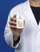 La Roche-Posay Anthelios UVMUNE 400 ochranný tónovaný fluid na obličej SPF 50+ 50 ml