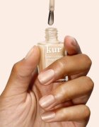LONDONTOWN Kur Tinted Fortifying Ridge Filler vyhlazující podkladový lak na nehty pro suché a křehké nehty odstín Apricot Beige 12 ml