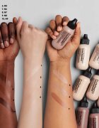 MAC Cosmetics Studio Radiance Face and Body Radiant Sheer Foundation lehký make-up na obličej a tělo odstín N4 50 ml