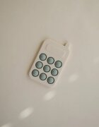 Mushie Pop-It Phone aktivity hračka pro děti Cambridge Blue 10m+ 1 ks