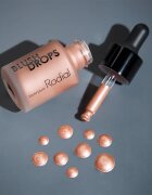 Rodial Blush Drops tekutá tvářenka a lesk na rty dodávající hydrataci a lesk odstín Sunset Kiss 15 ml