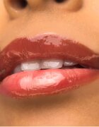 theBalm Plump Your Pucker Lip Gloss lesk na rty pro větší objem odstín Wild West 2.7 ml