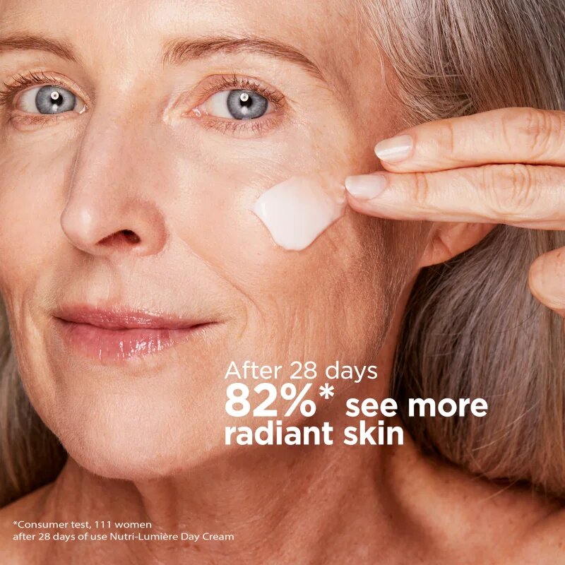 Clarins Nutri-Lumière Day revitalizační denní krém pro zářivý vzhled pleti 50 ml