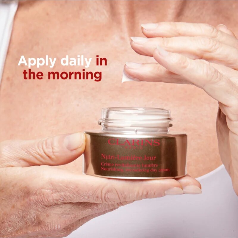 Clarins Nutri-Lumière Day revitalizační denní krém pro zářivý vzhled pleti 50 ml