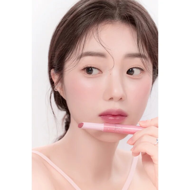 Dasique Melting Candy Balm intenzivní balzám na rty s vysokým leskem odstín 05 Sugar Plum 1.5 g