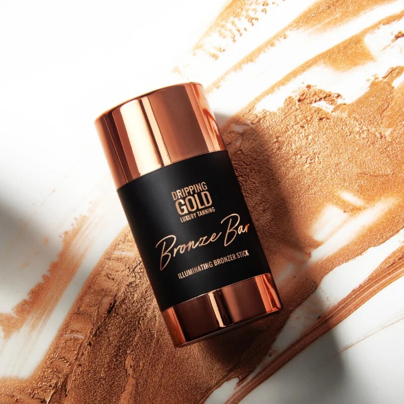 Dripping Gold Luxury Tanning Illuminating Stick rozjasňující bronzer na obličej a tělo odstín Bronze 36 g
