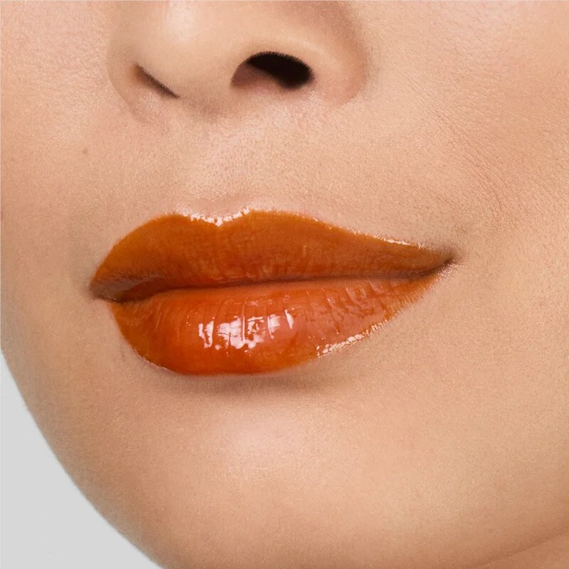 Estée Lauder Pure Color Melt-On Glosstick vysoce pigmentovaný lesk na rty v tyčince odstín Melted Tangerine 1.8 g