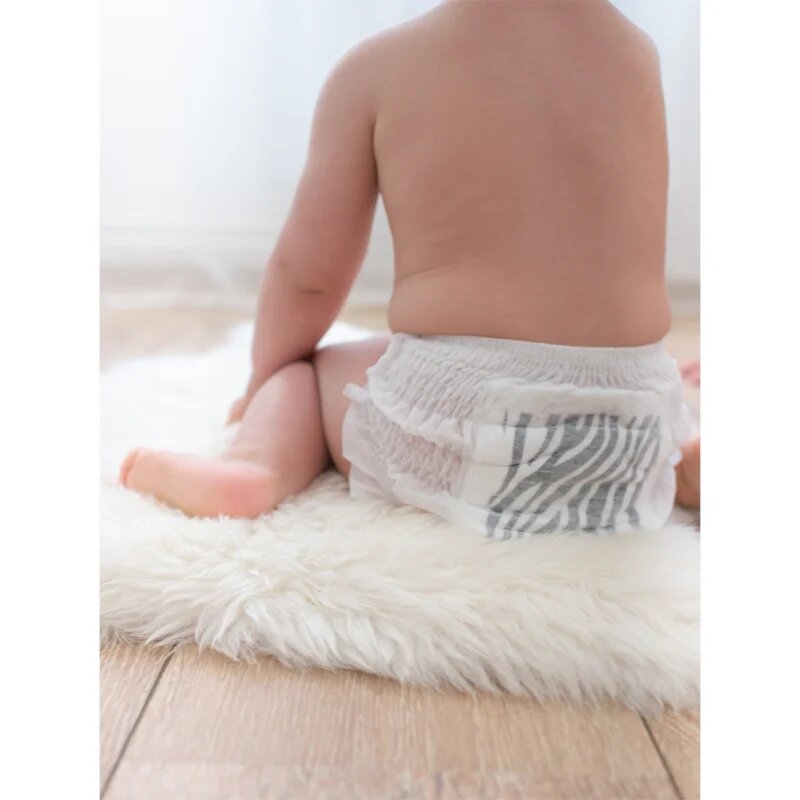 Kolorky Deluxe Velvet Pants Wild jednorázové plenkové kalhotky velikost XL 12-16 Kg 17 ks