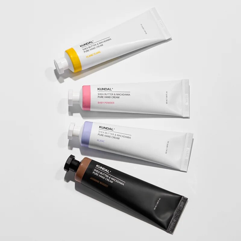KUNDAL Shea Butter & Macadamia Jasmine Woody hydratační krém na ruce s vyživujícím účinkem 50 ml