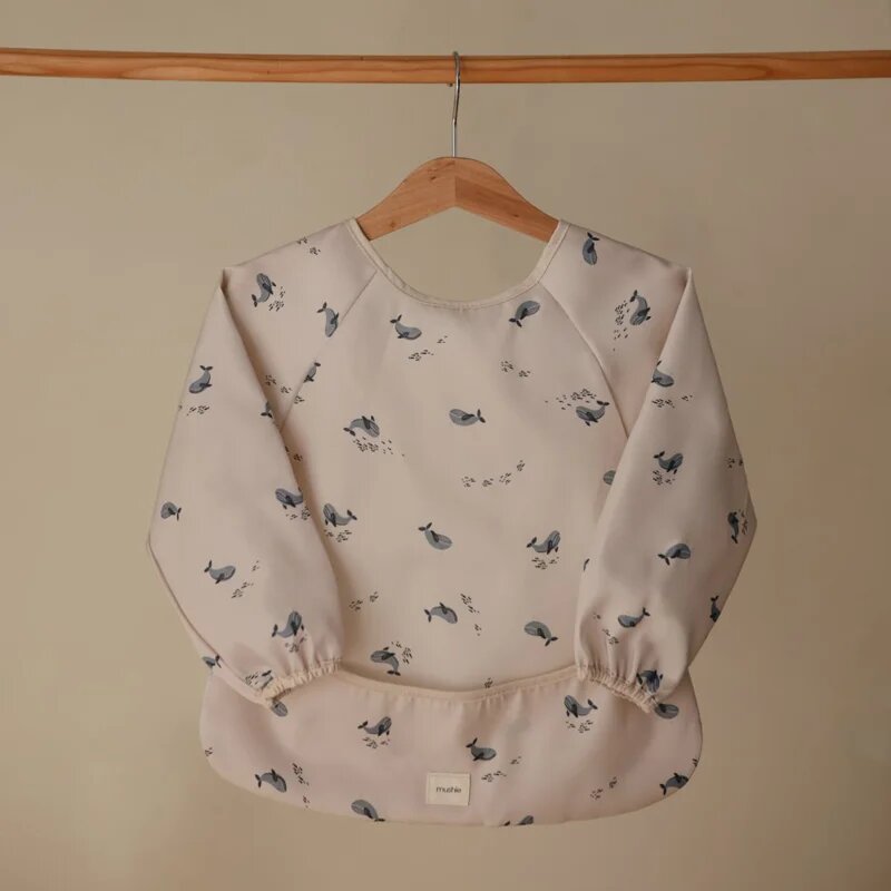 Mushie Long Sleeve Bib bryndák Whales 6-24m 1 ks