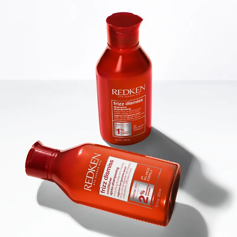 Redken Frizz Dismiss výživné olejové sérum pro nepoddajné a krepatějící se vlasy 125 ml
