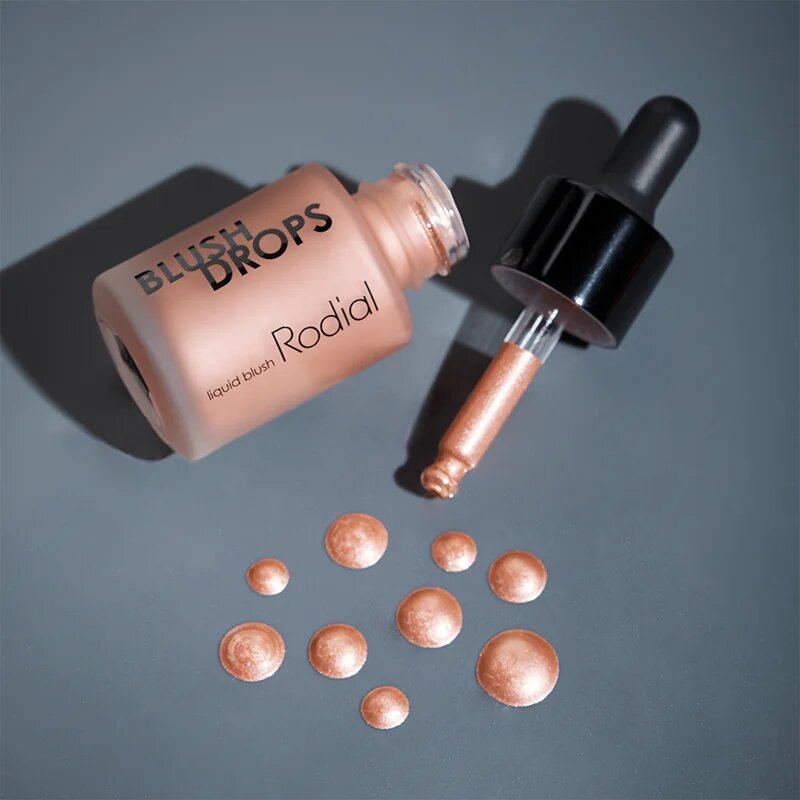 Rodial Blush Drops tekutá tvářenka a lesk na rty dodávající hydrataci a lesk odstín Sunset Kiss 15 ml