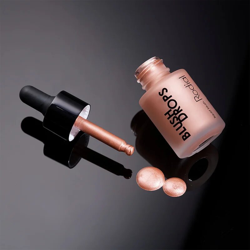 Rodial Blush Drops tekutá tvářenka a lesk na rty dodávající hydrataci a lesk odstín Sunset Kiss 15 ml